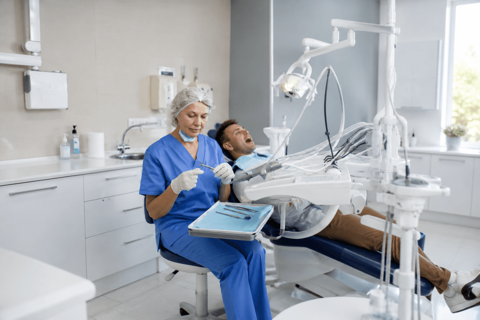 A dental offices business owner at work